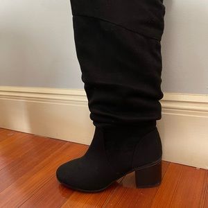 Knee high black suede boots